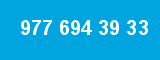 977 694 39 33